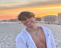 The star loves to spend his time on the beach.